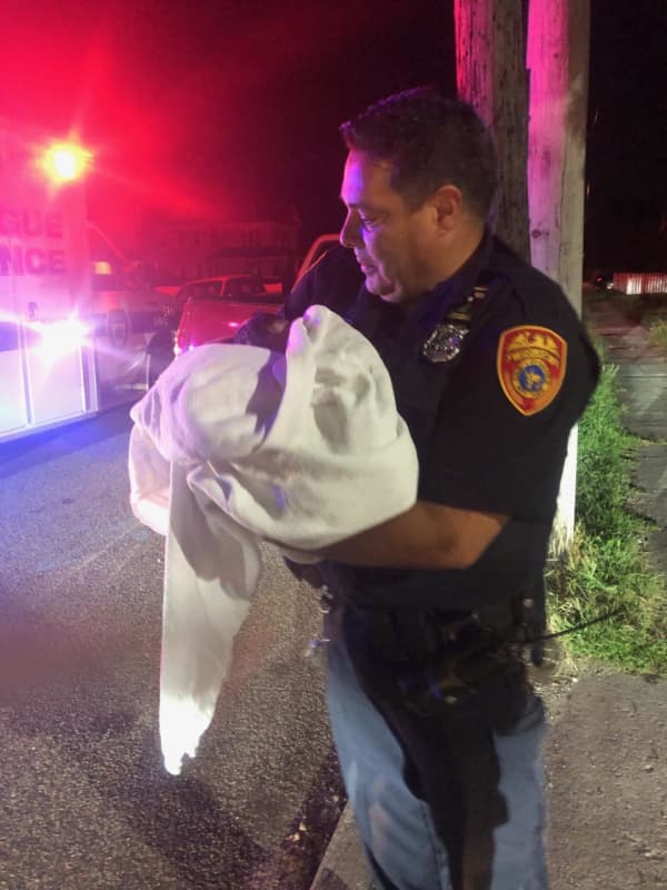 Police Officer Assists In Delivering Baby Girl