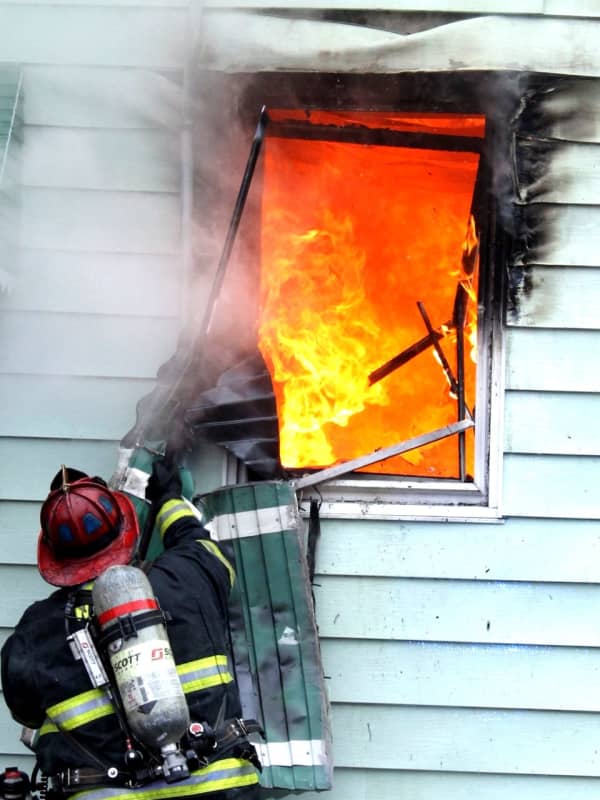 PHOTOS: Fierce Fire Roars Through Three Passaic Homes, Displacing Dozens