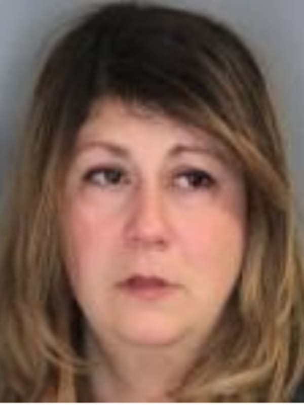 Police: Area Woman Made 7-Year-Old Stay Outside During Storm