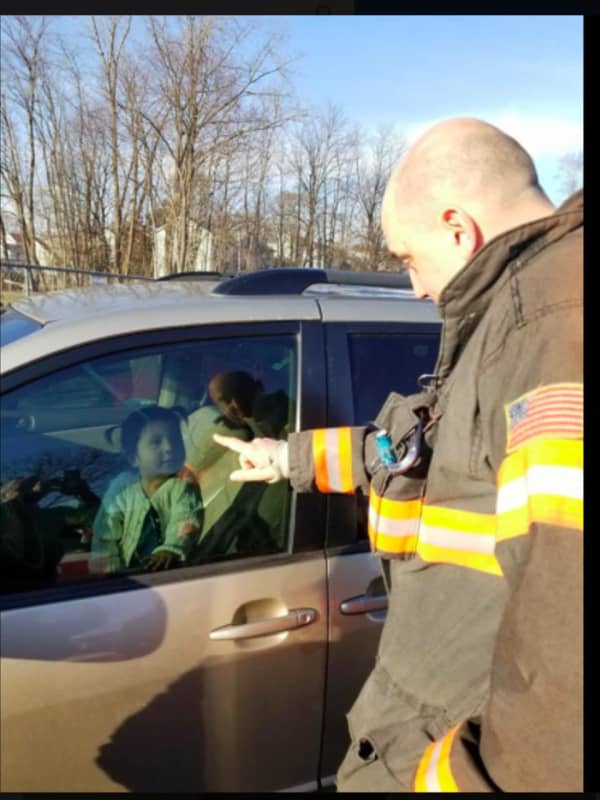 Firefighters Rescue Young Girl From Locked Minivan In Danbury