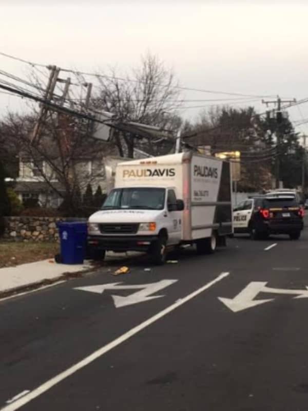 Box Truck Crashes Into Telephone Pole, Splitting It In Half, In Norwalk