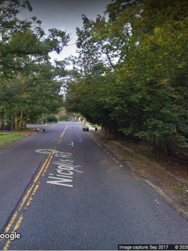 Armed Man Impersonating Delivery Driver Burglarizes Occupied Suffolk Home