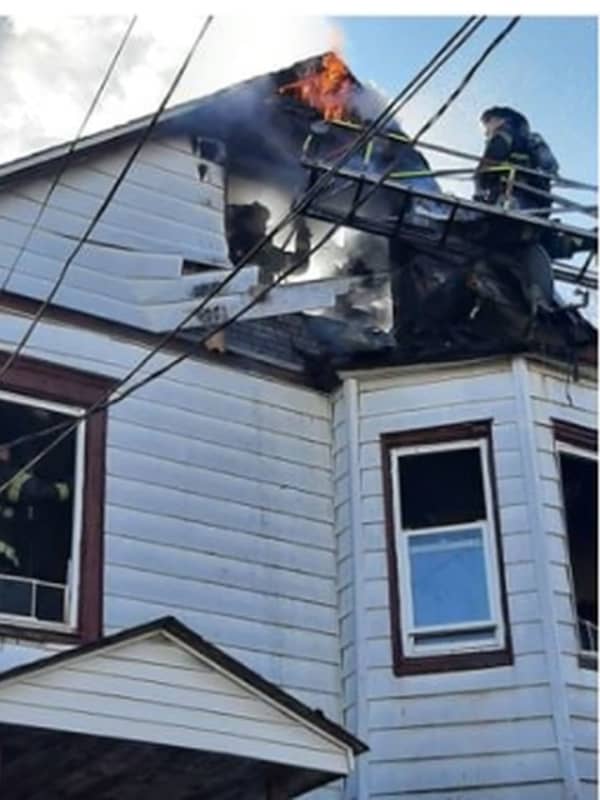 Woman Leaps From Roof To Escape Newark House Fire, 2 Families Displaced
