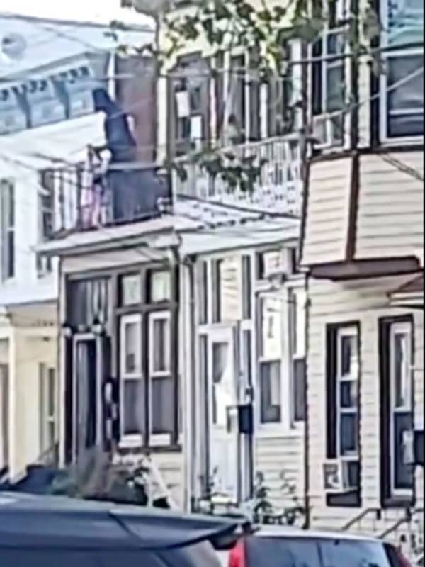 Officer Catches Infant Who Man Dangled Off Balcony For 2 Hours In Jersey City (VIDEO)