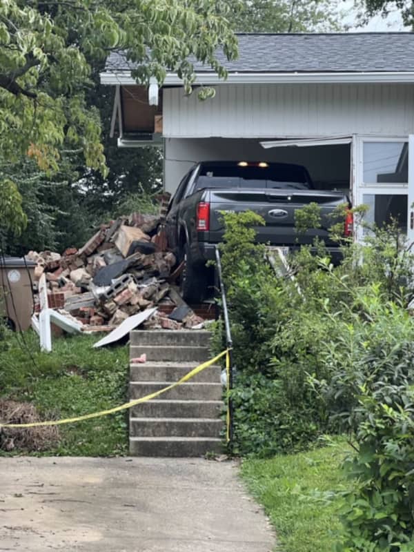 Driver Trapped, Charged After Crashing Pick-Up Into Rockville Home