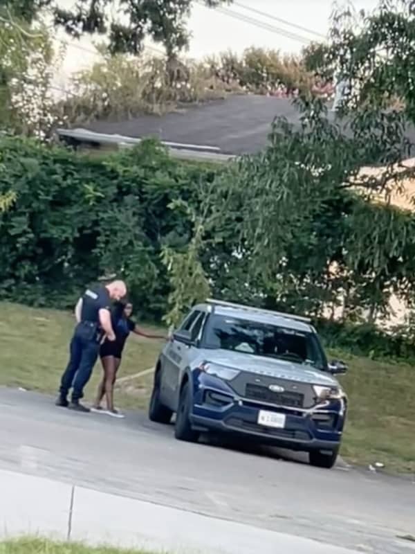 TikTok Video Shows Officer Embracing Woman Before Getting Into Patrol Car In Maryland