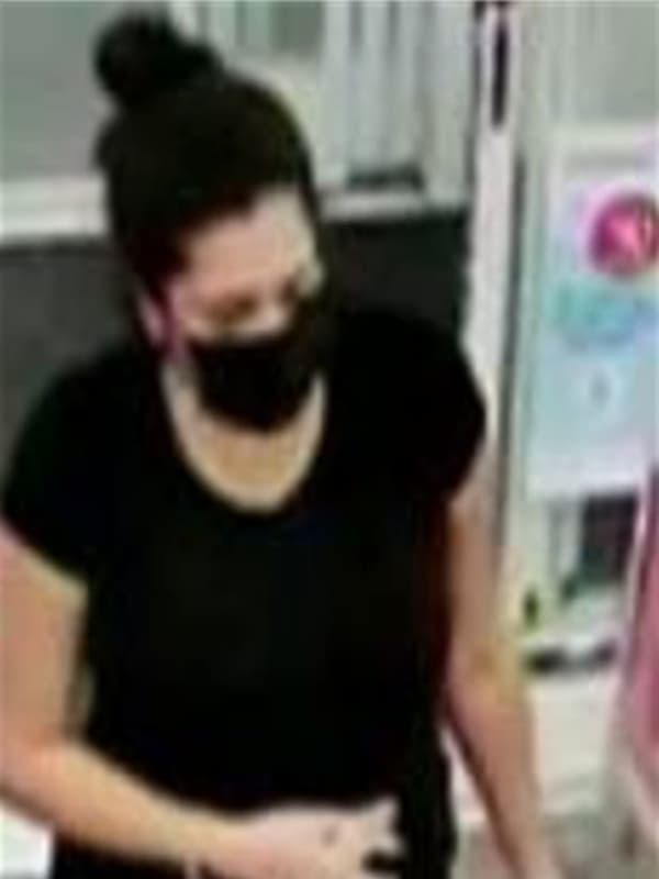 Police Search For Woman Accused Of Using Counterfeit Money At Suffolk CVS