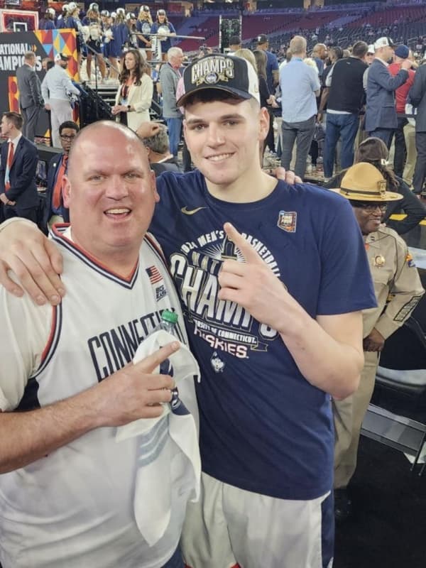 Star Donovan Clingan's Dad, An Eversource Worker By Day, Watches UConn Defend National Title