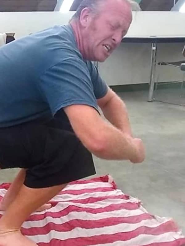 Homeless Man Who Pretended To Defecate On Flag In Library Raises $1,000 Online For Fines