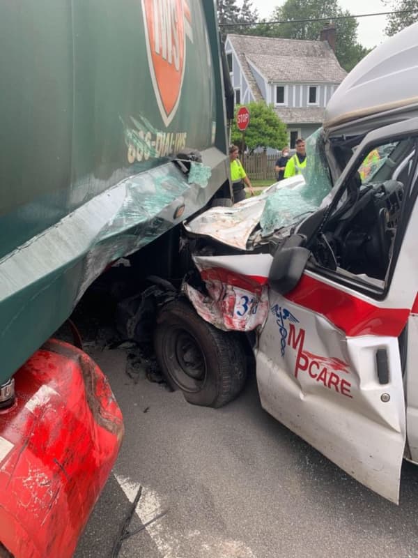 Ambulance Driver Ejected In Norwood Garbage Truck Crash