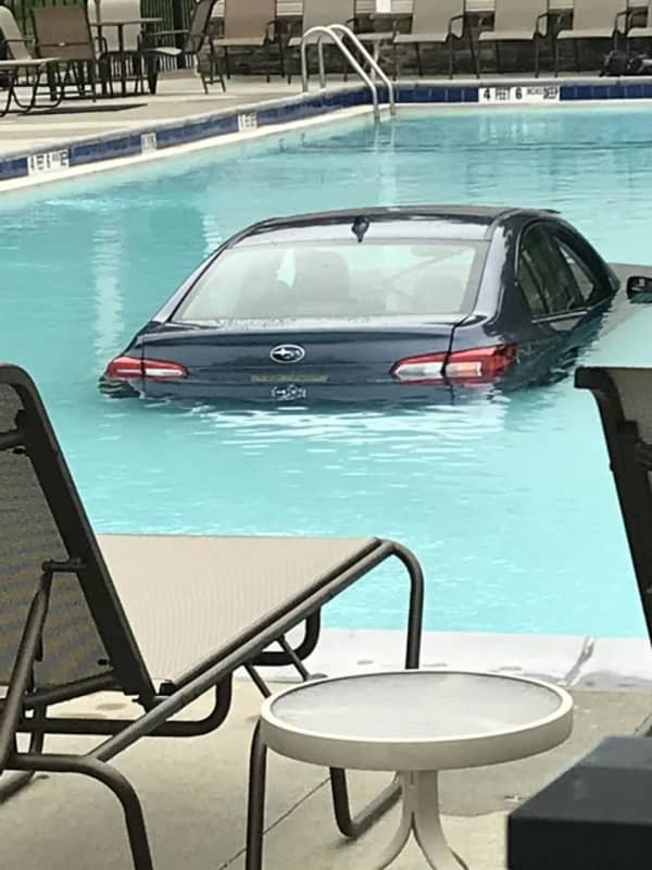 Woman Hits Gas Instead Of Brake, Ends Up In Carmel Pool, Police Say