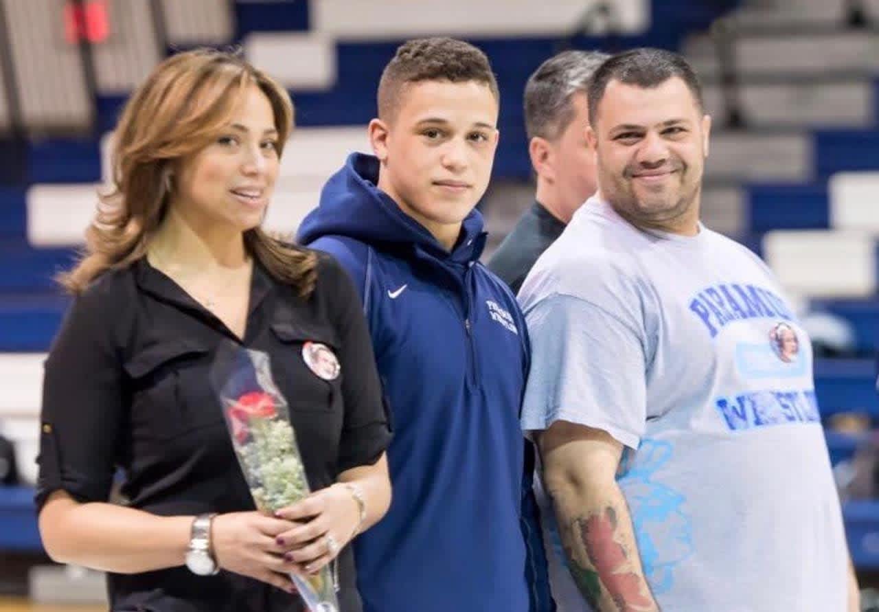 Alex Sebahie with his parents, Rosie and Issa