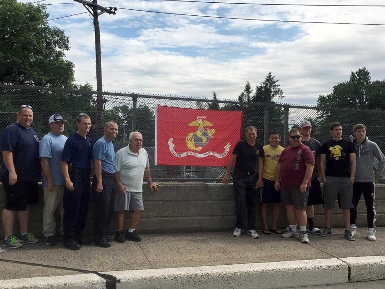 Vets, firefighters with the new flag.