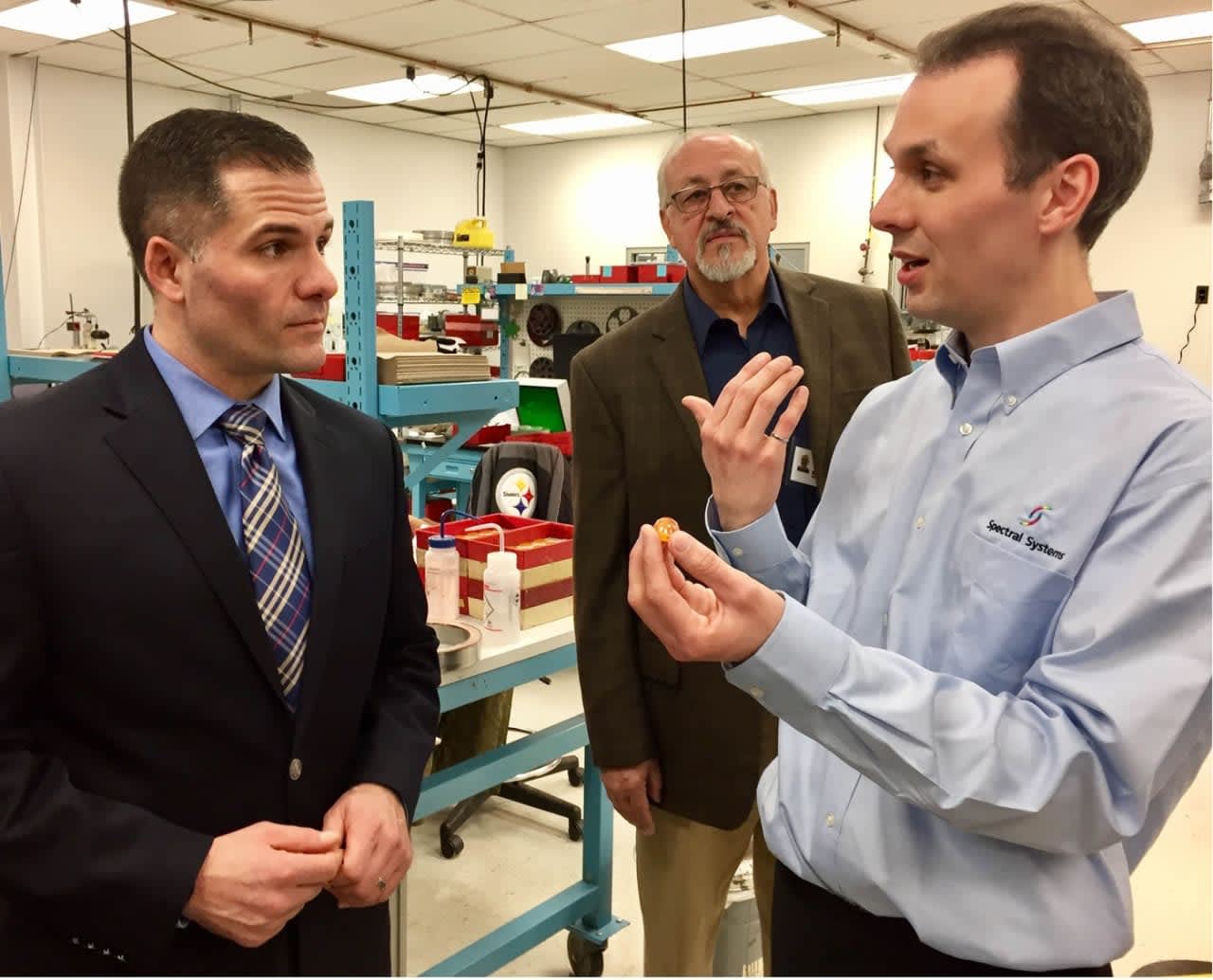 County Executive Marc Molinaro (left) and Christopher Harrower, a senior process engineer at Spectral Systems.