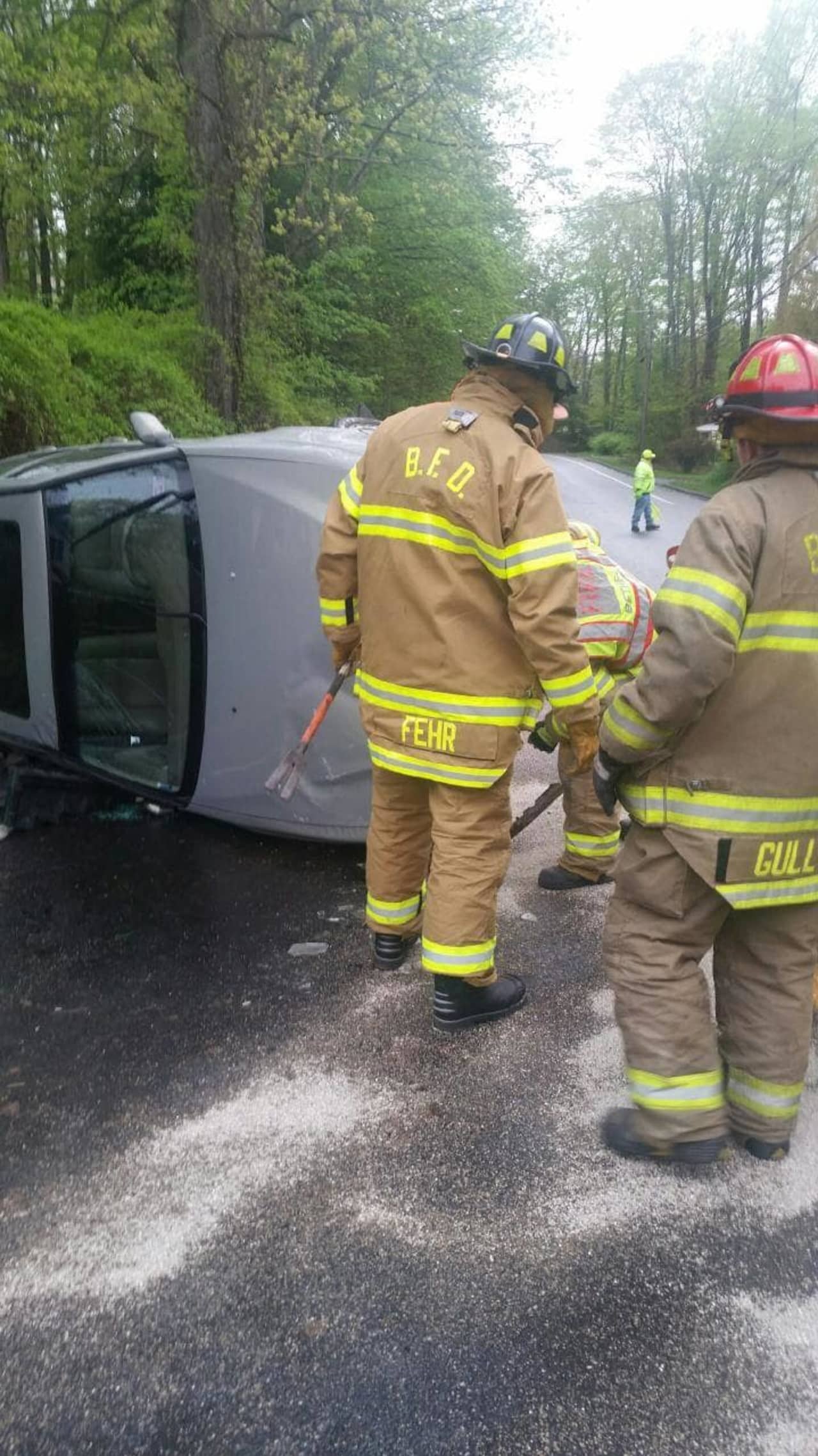 Crews from Bethel respond to an overturned vehicle.