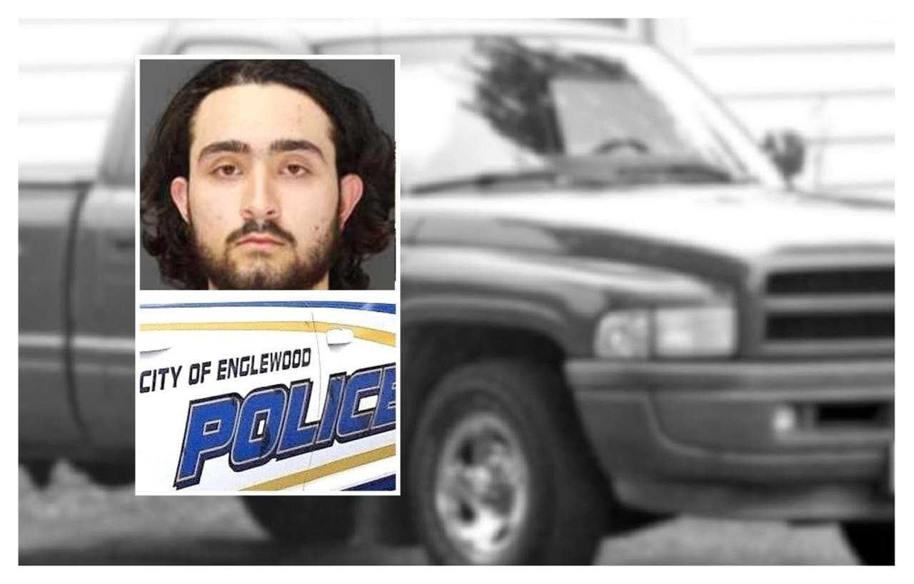 Nicolas Gallego / BACKGROUND: Similar 1996 Dodge Ram pickup truck