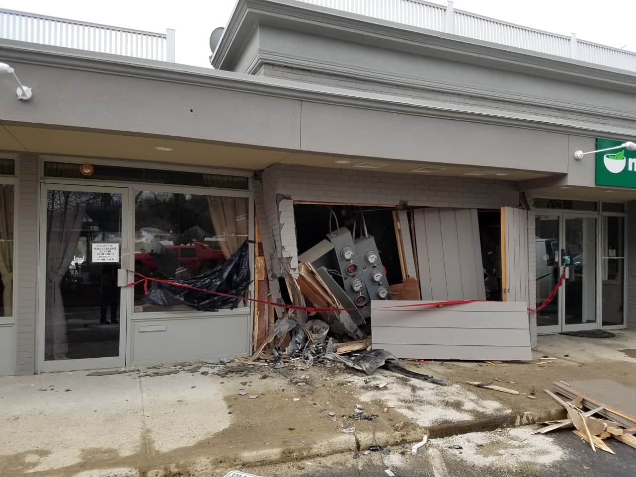 The facade was damaged at Naked Greens on Route 7 in Wilton after a car slammed into the building in March.