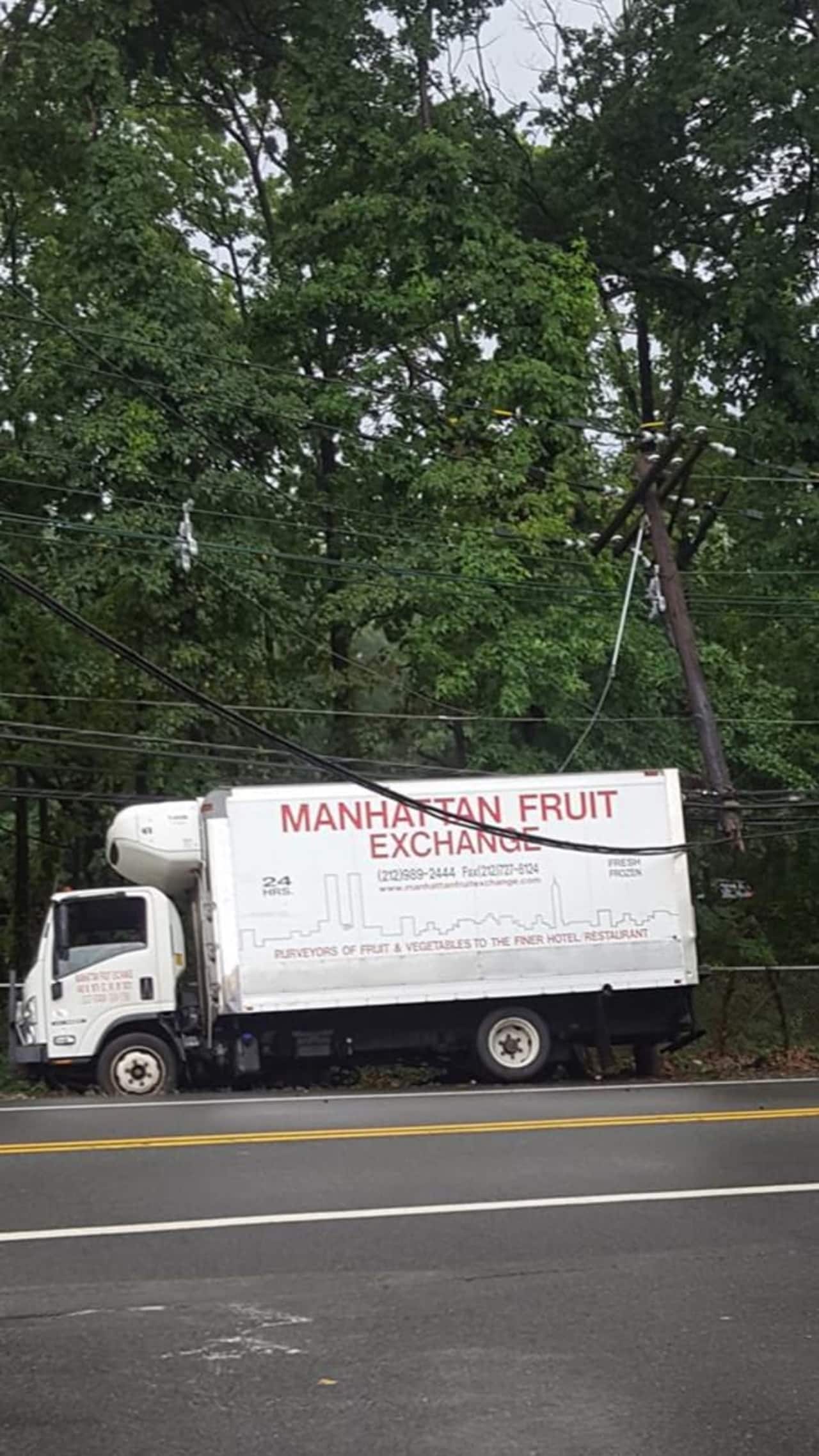 The driver had to remain in his cab until the power could be cut.
