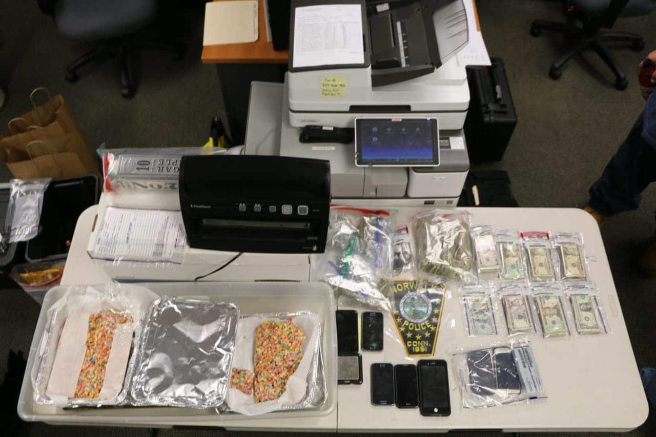 Officers found 200.36 grams of marijuana, four jars of wax marijuana, several trays of homemade edibles believed to be laced with marijuana and $8,137 in cash along with drug paraphernalia in a home in Norwalk, police said.