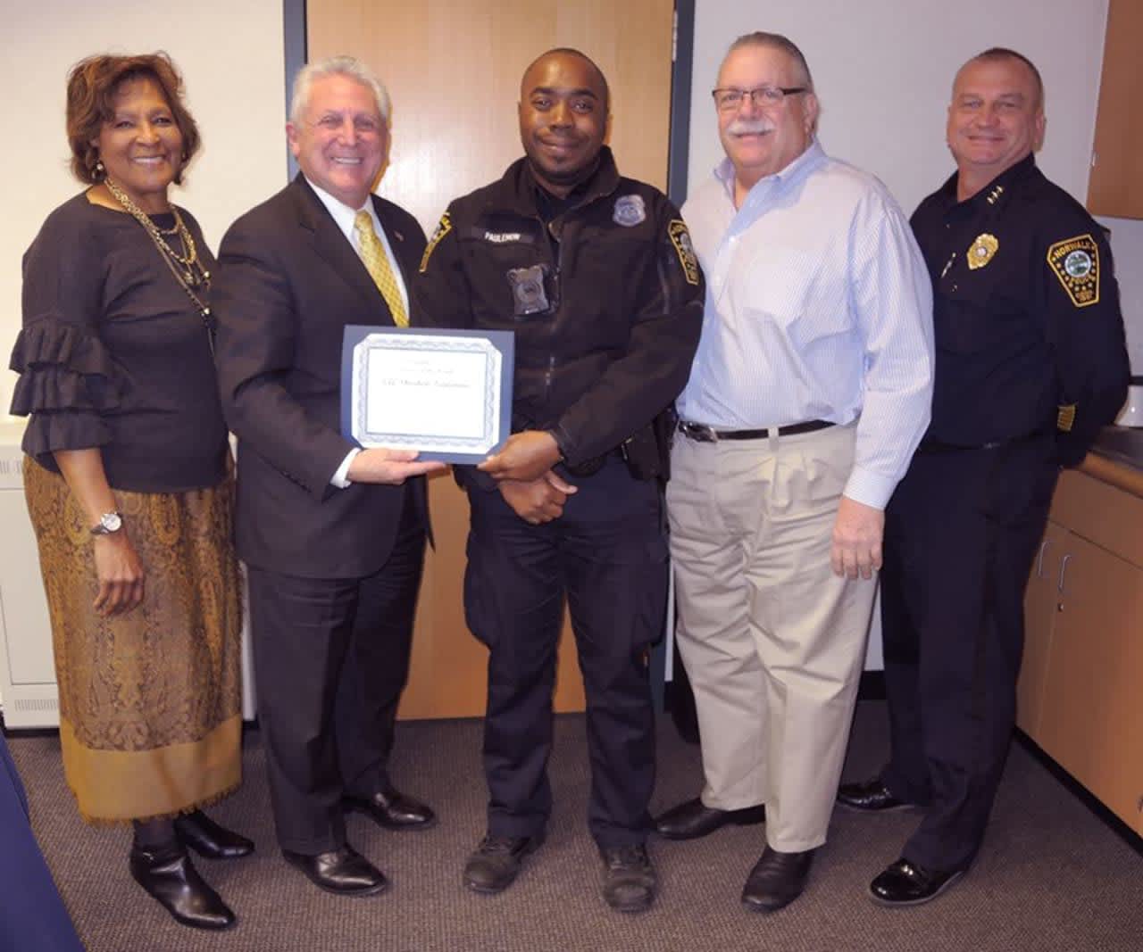 Commissioner Collier-Clemmons, Mayor Rilling, Officer Paulemon, Commissioner Yost and Chief Kulhawik