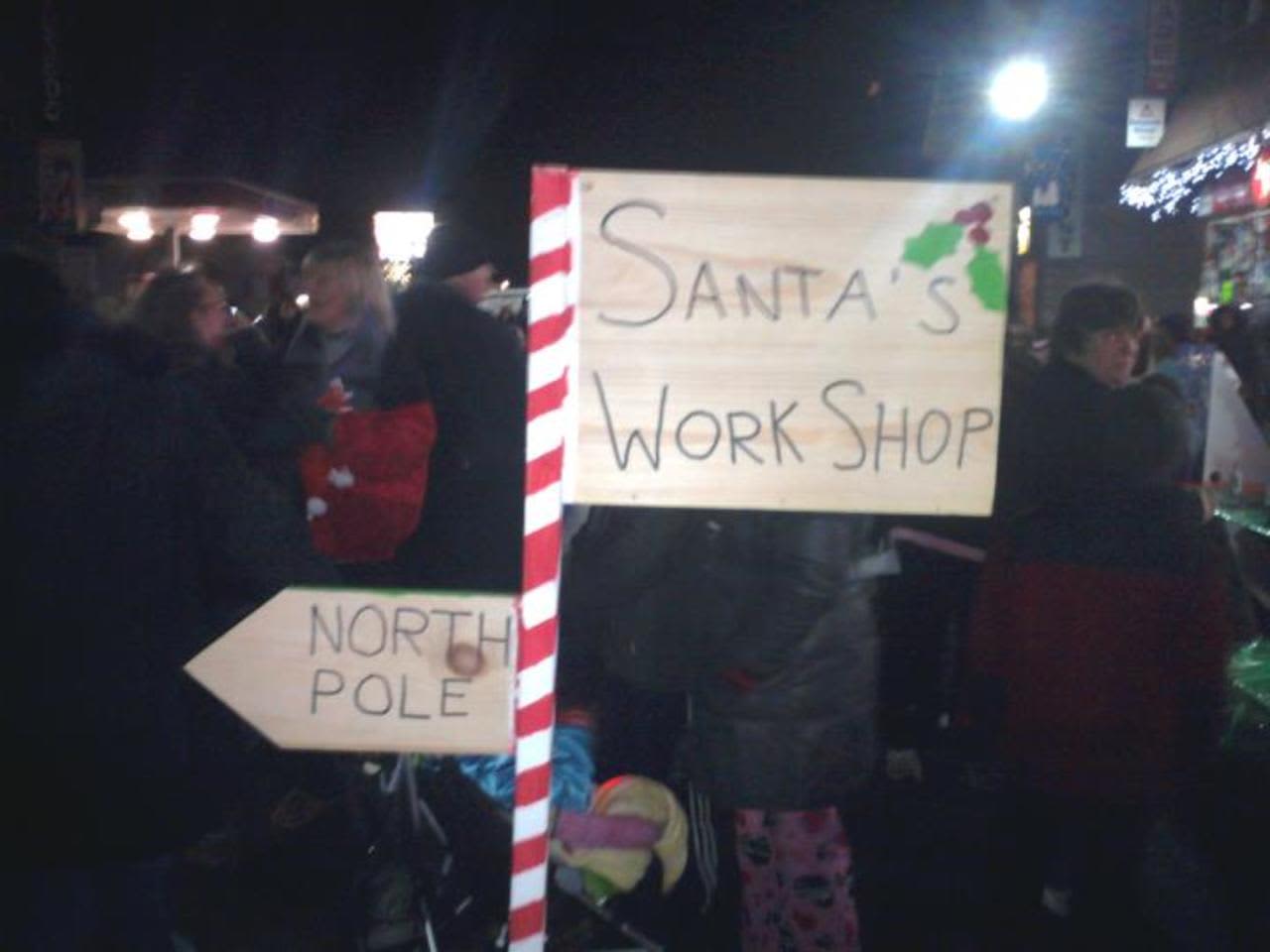 Signs direct people to the fun at a previous Pompton Lakes Holiday Stroll.