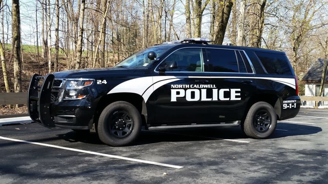 A North Caldwell police officer suffered non-life-threatening injuries after he was dragged while trying to stop a stolen car Wednesday, officials said.