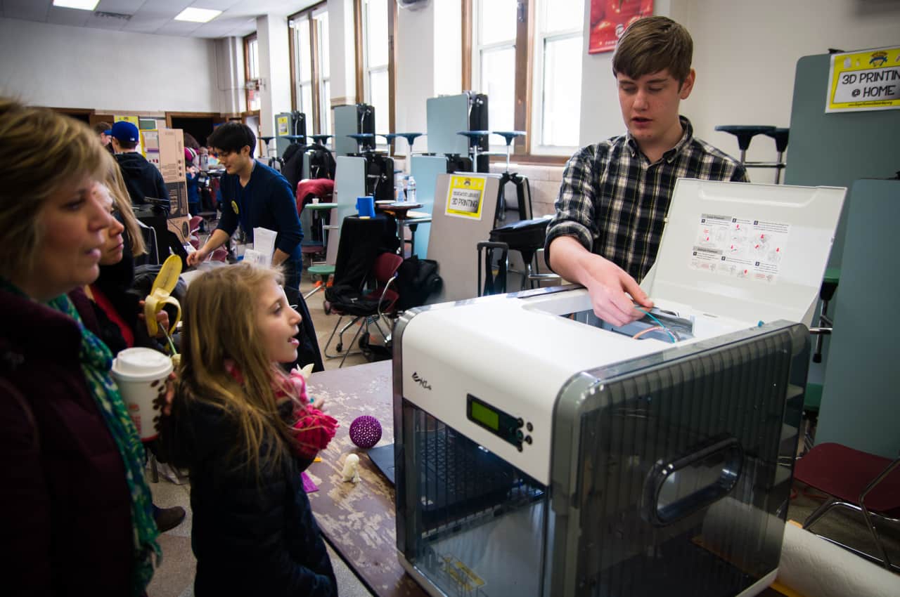 Ridgewood families learn about the 3-D printer at Super Science Saturday.
