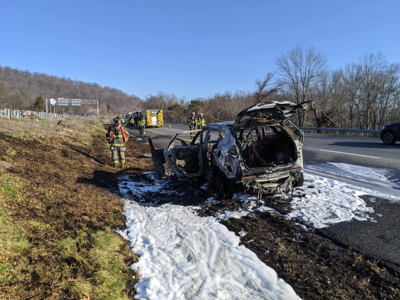 A car fire on 78 Sunday spread to the roadway and some nearby brush