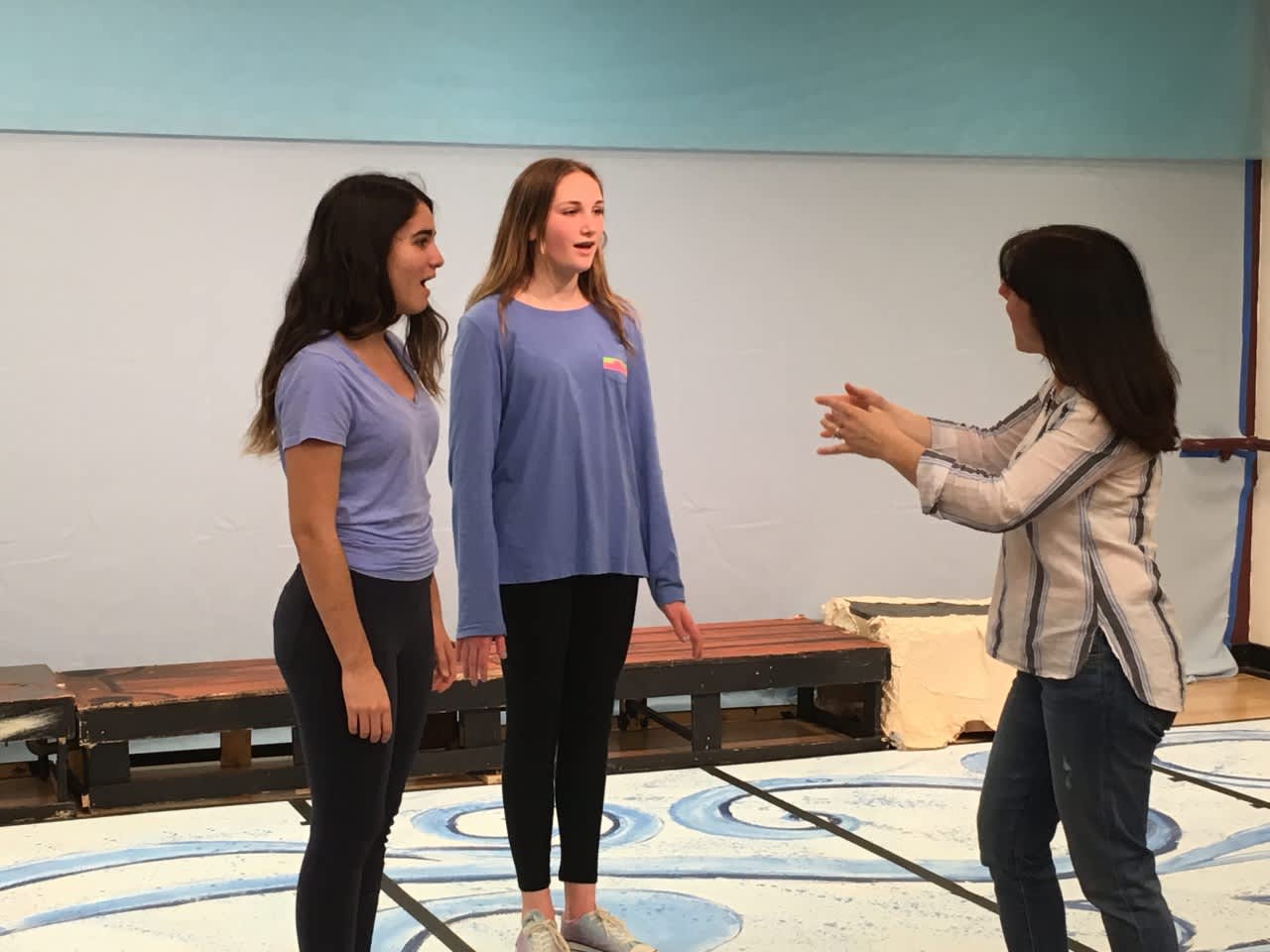 Briarcliff Middle School students portraying Ariel and Ursula rehearse for this week’s performances of “The Little Mermaid Jr.” with musical director Regina Leon.