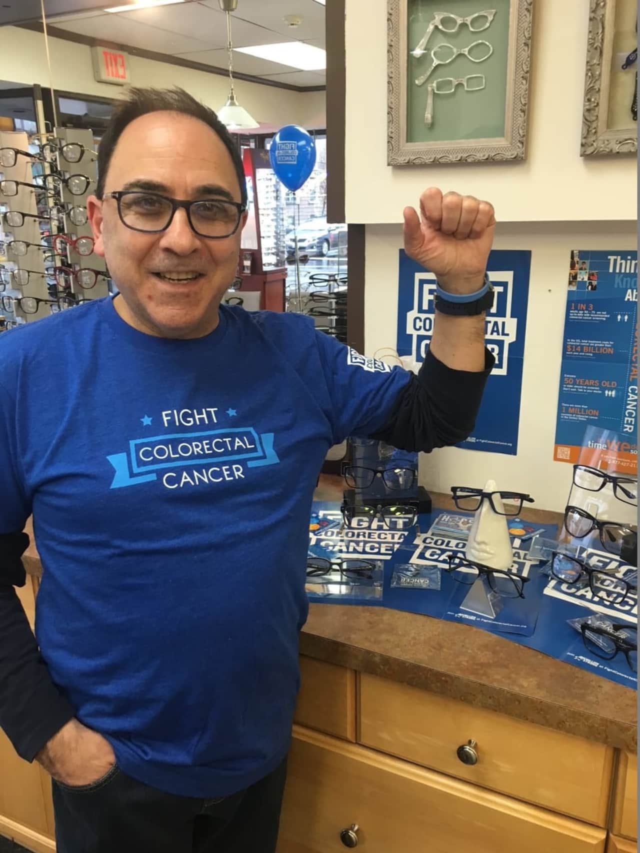 Fort Lee business owner and cancer survivor Bob Ceragno sports a "Fight Colorectal Cancer" t-shirt.
