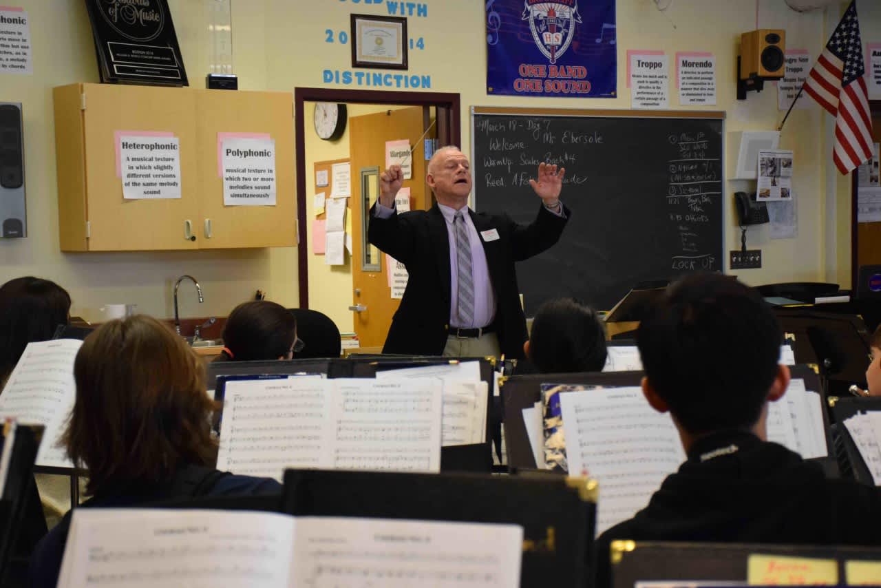Conductor Curt Ebersole leads a recent workshop for Briarcliff Middle and Briarcliff High School students.