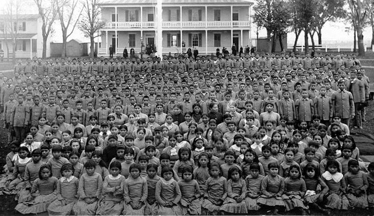 Photo of some of the students at the Carlisle Indian Industrial School, taken sometime between 1879 until 1918.