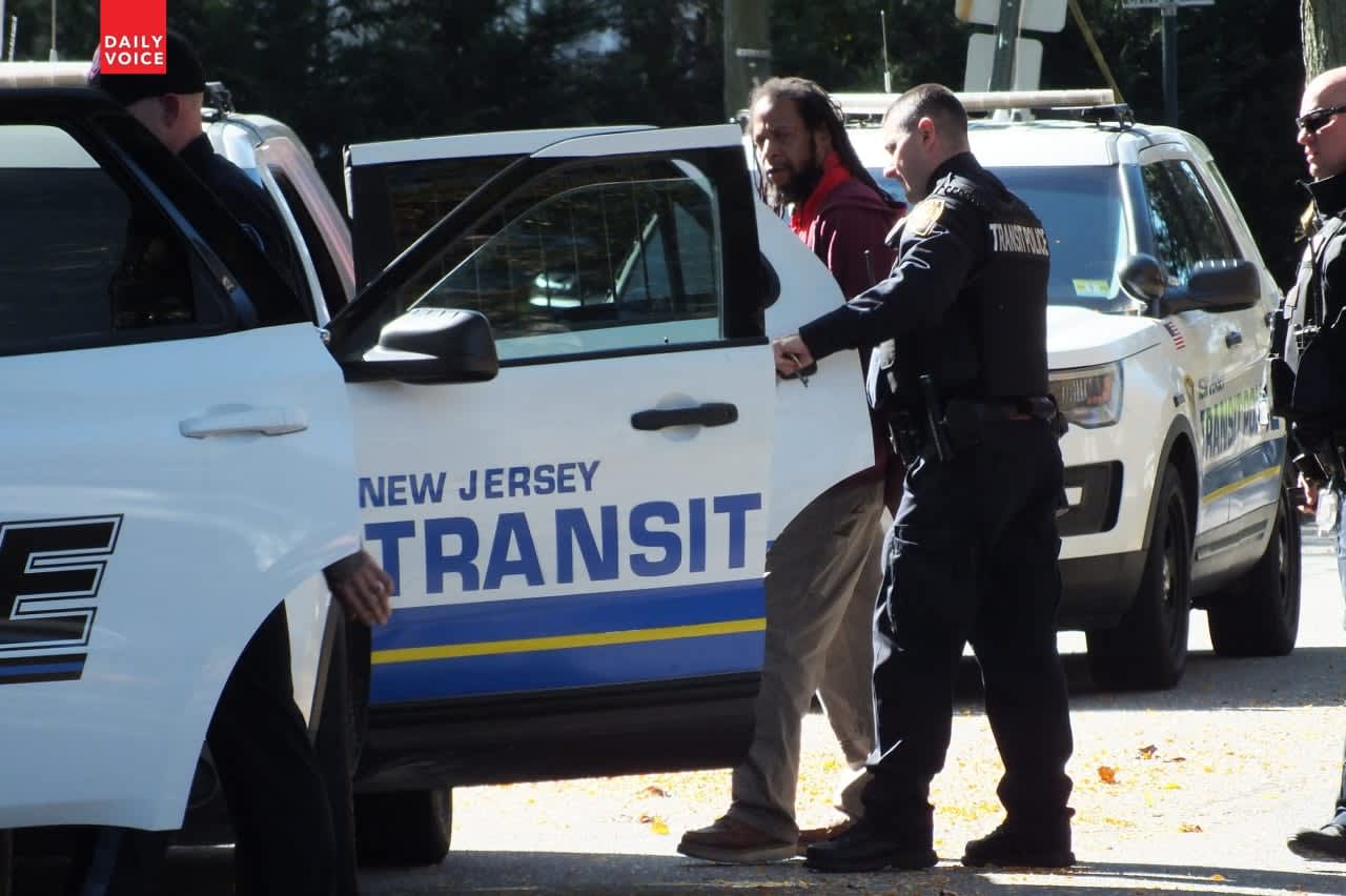 Keith Toussaint being taken into custody by NJ Transit PD.
