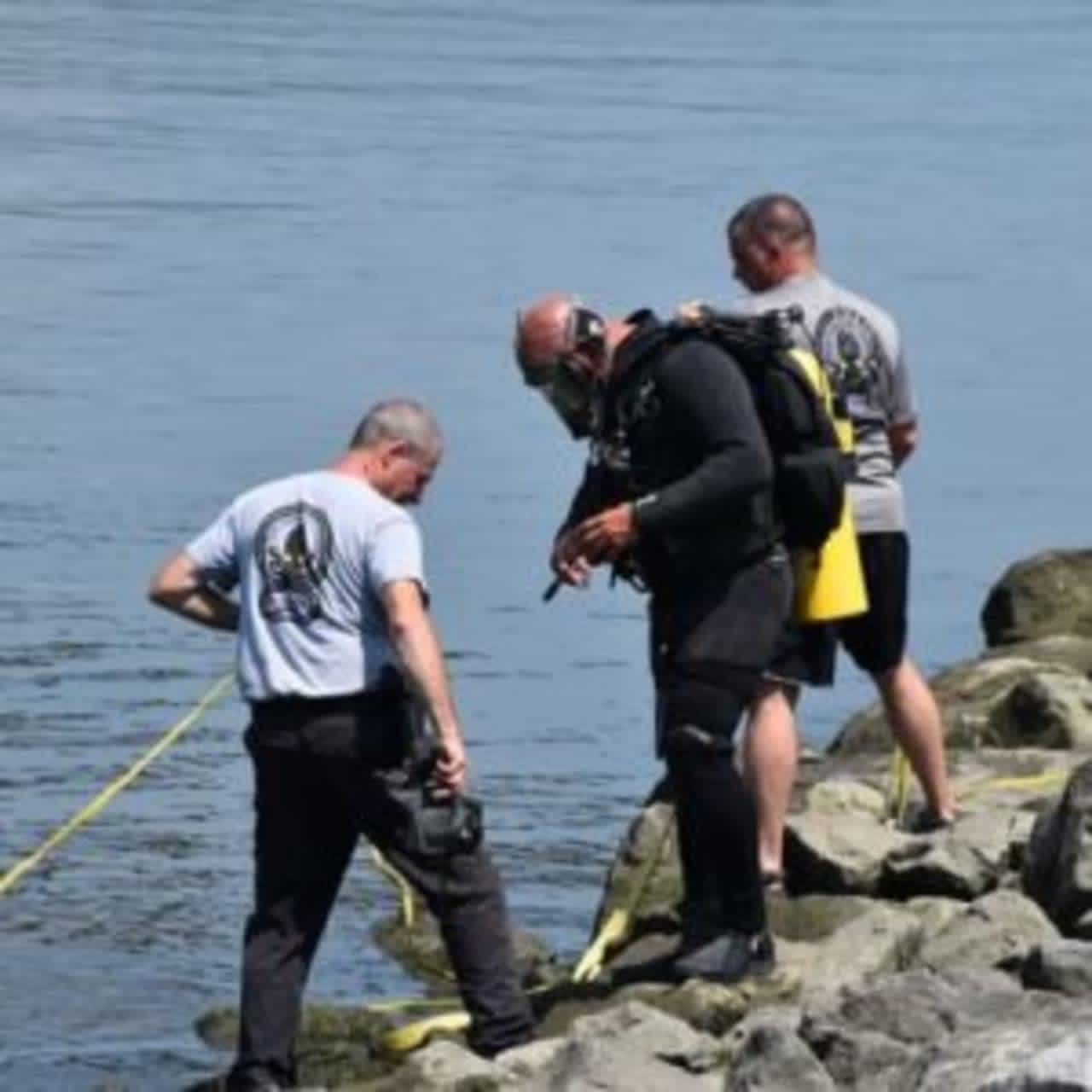 Diver's work to bring Brenda Kerber's vehicle to the surface from the bottom of the Muscott Reservoir.