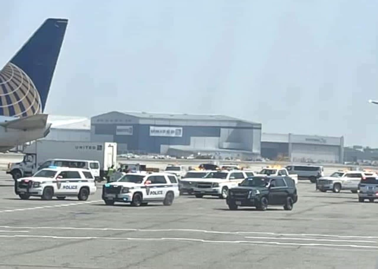 Port Authority police converge on Terminal C at Newark Airport.