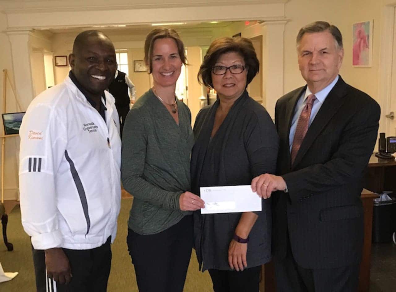 Darien Rowayton Bank supports the work of Norwalk Grassroots Tennis & Education. See story for IDs.