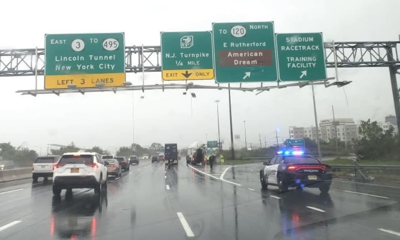 Lights fell or were left hanging from the signs on eastbound Route 3 in East Rutherford.