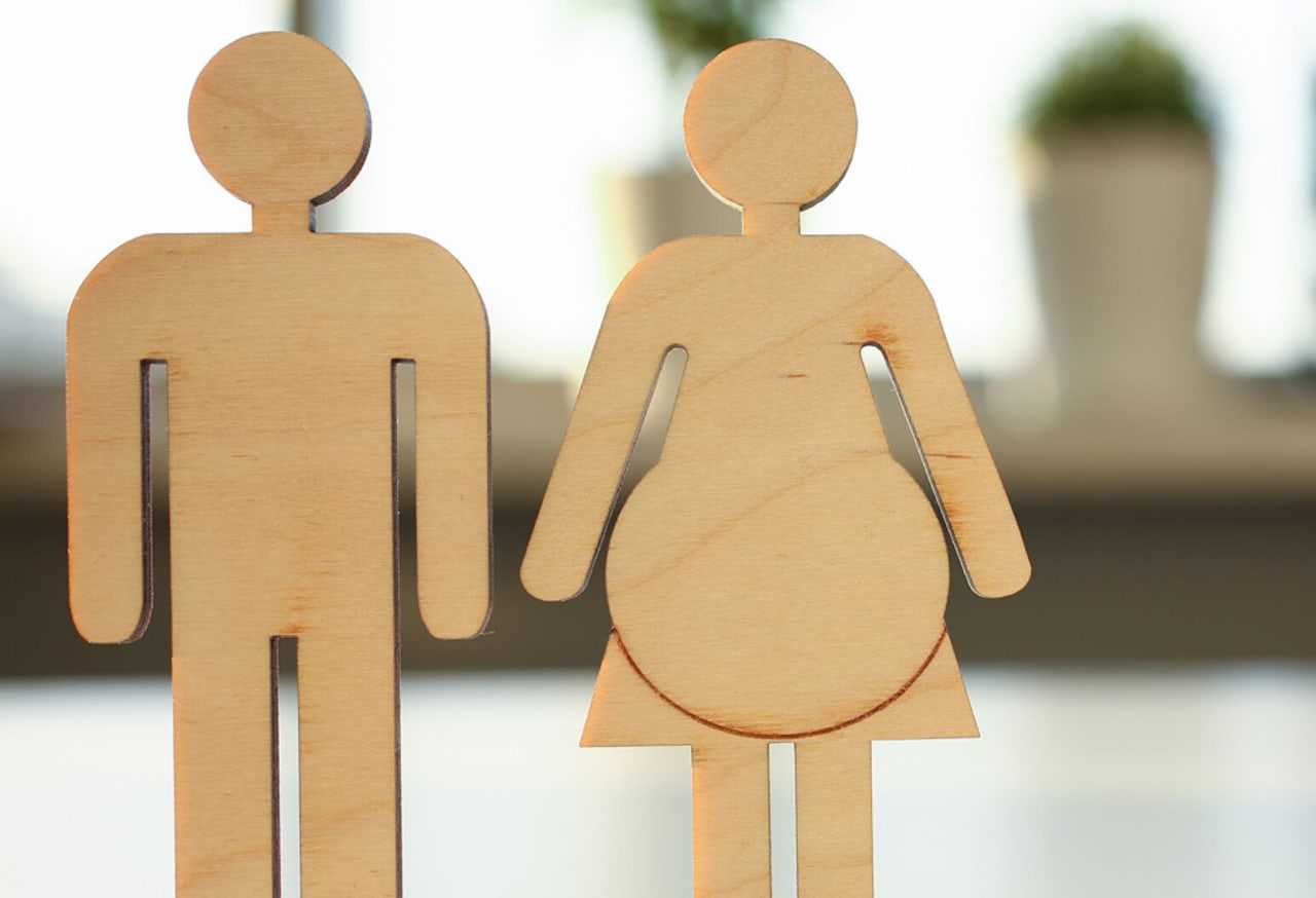 An expert offers questions to consider before conceiving during COVID-19.
