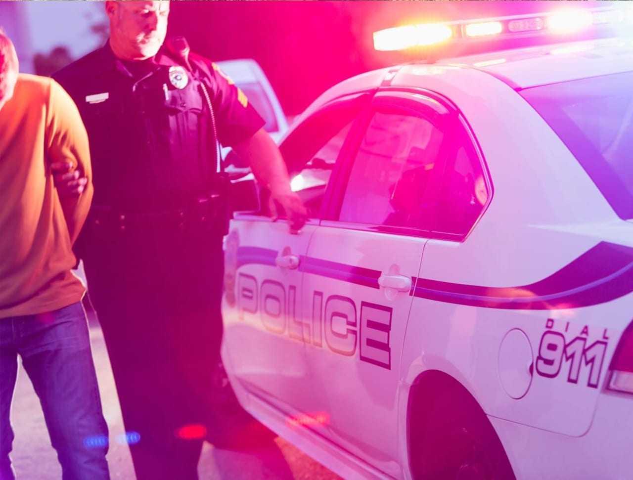 Police Arresting Suspected Drunk Driver