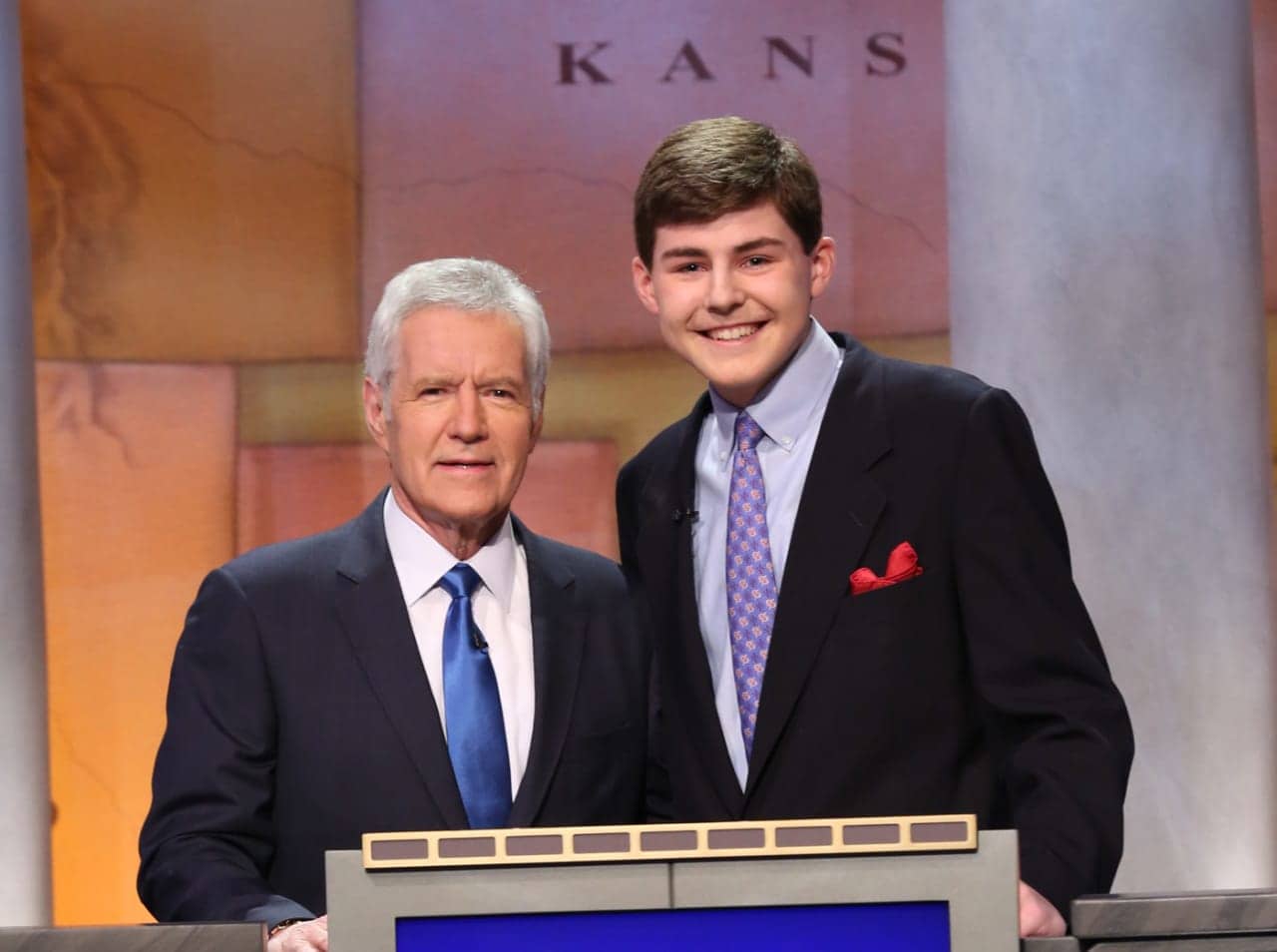 Porter Bowman, a junior at St. Luke’s School in New Canaan, a competitor in the 2016 'Jeopardy Teen Tournament,' is with the show's host, Alex Trebek.