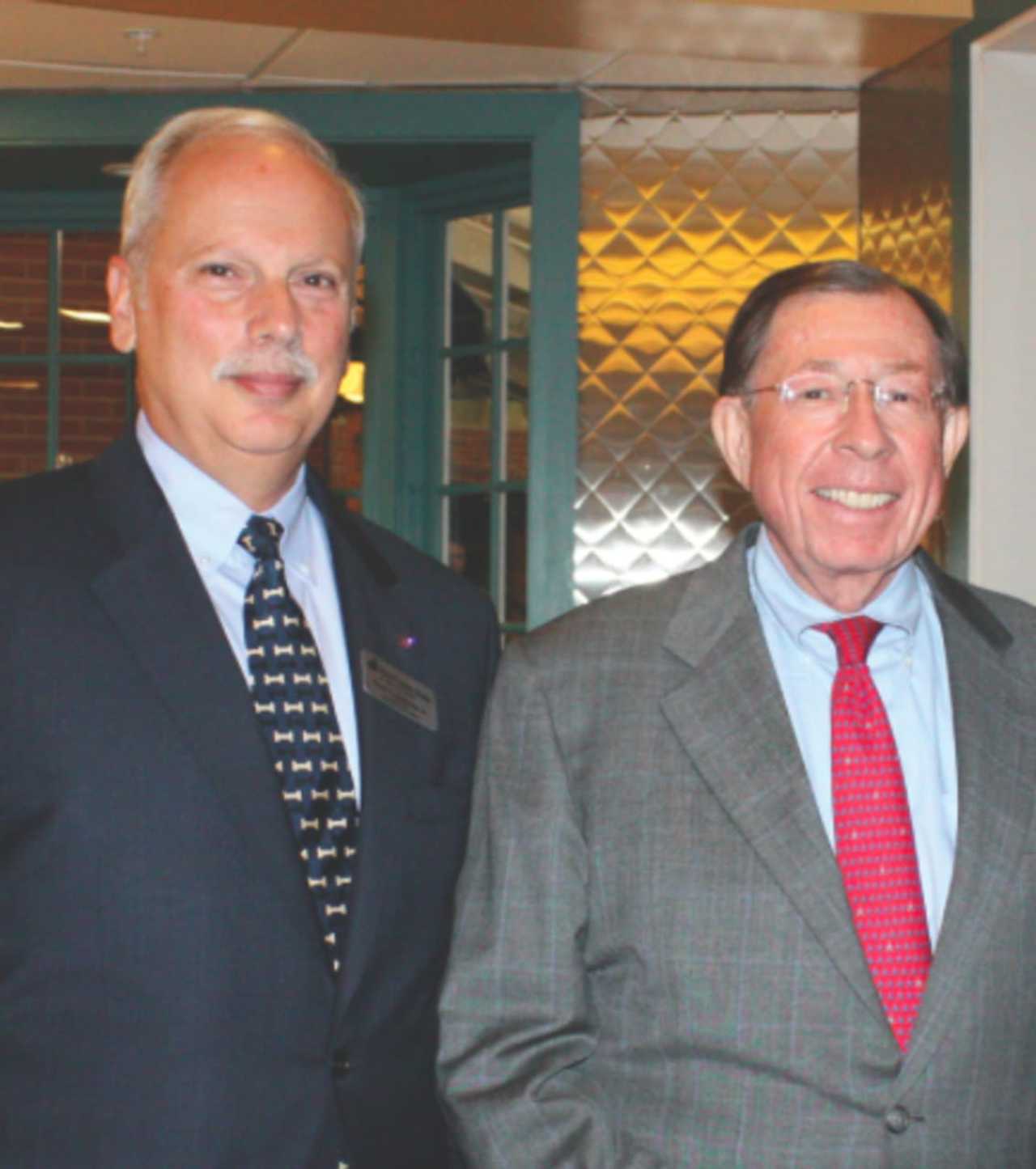 Harry T. Rein, left, and Reyno Giallongo, Jr., chairman of the board and CEO of First County Bank and president of First County Bank Foundation.