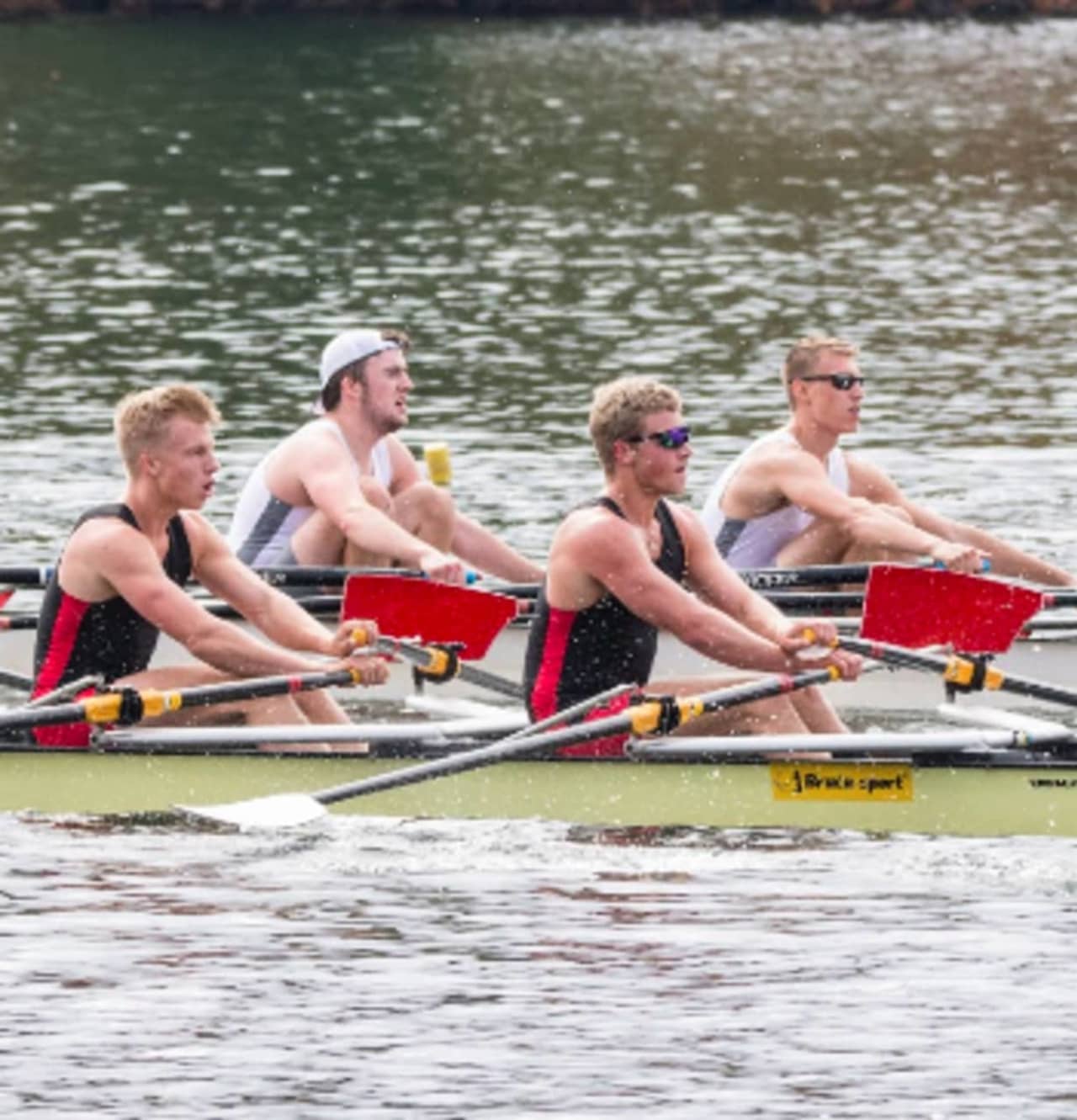 Joel Barlow High School senior Aidan Bridwell, seated second from right with his teammates, continues to rack up the gold medals at local regattas.