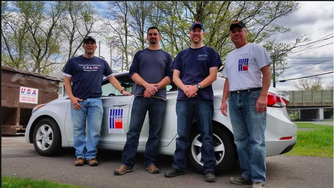 Newtown Police Department Lieutenant Dave, Sergeant Matt Wood and Officer Jason Flynn spent the day recently with John Viola of Heart 9/11 making preparations for a rebuild of a disabled veteran's home in East Windsor.