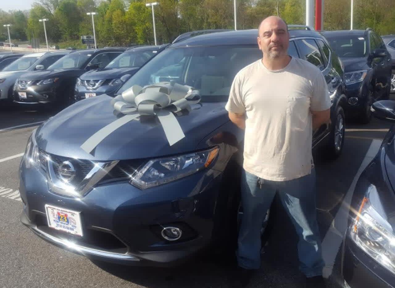Ed D'Amico and his Nissan Rogue.