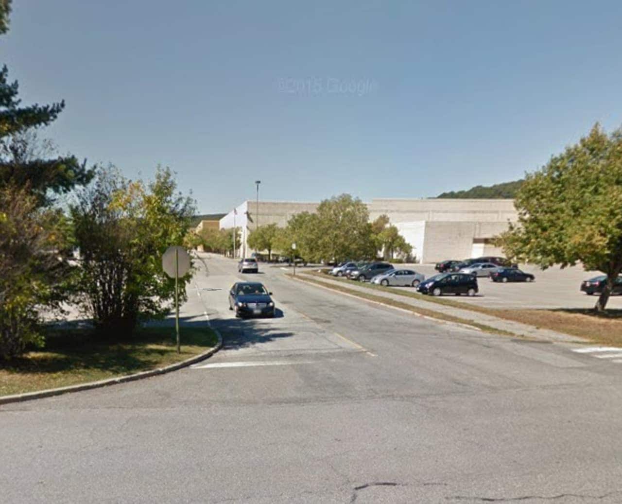 Yorktown police arrested a 37-year-old Ossining woman Thursday after Sears employees said she tried to leave the store without paying for clothes valued at $265, police said.
