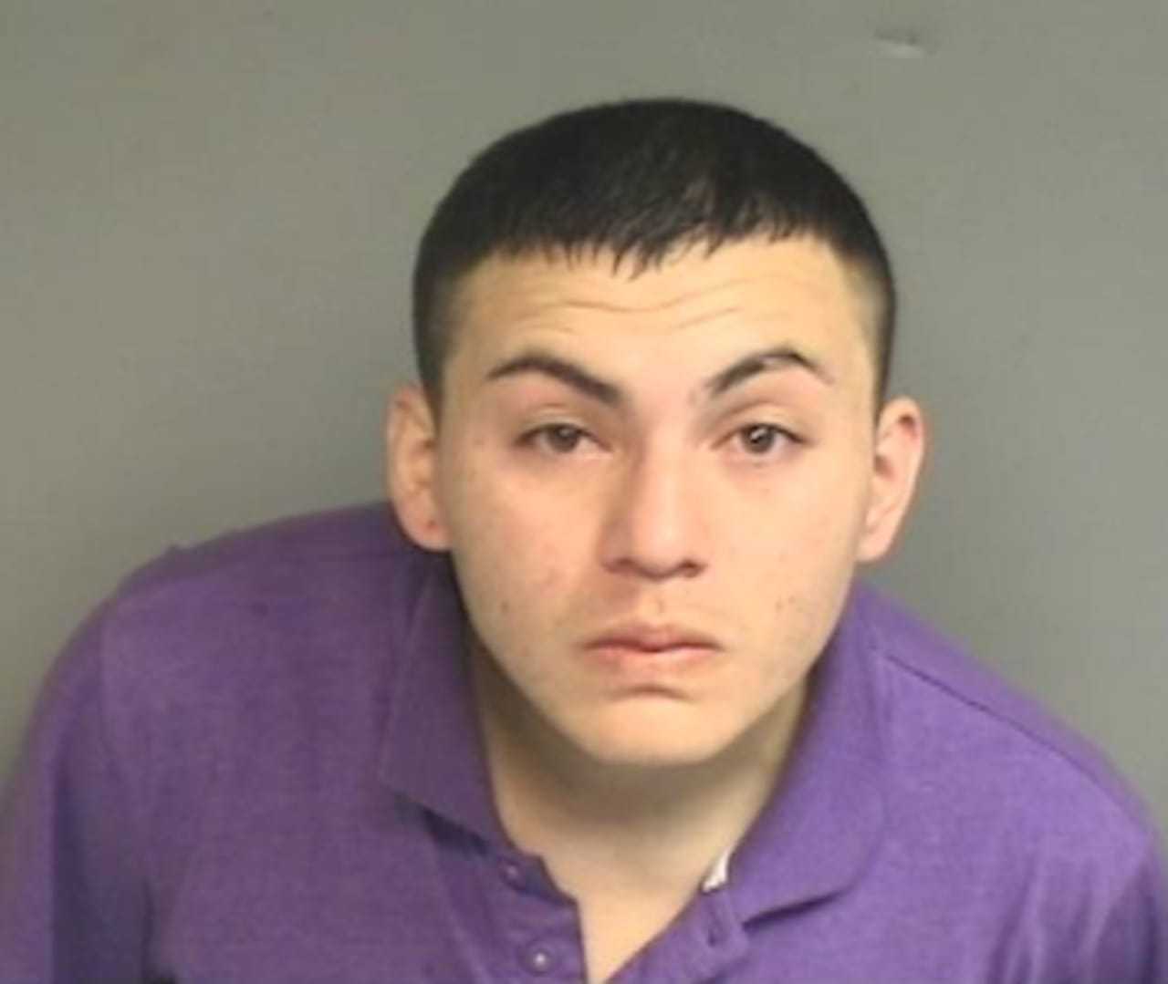 Oscar Tello-Ortiz, 27, of Stamford, is charged with attacking his ex-girlfriend early Monday on Cove Road.
