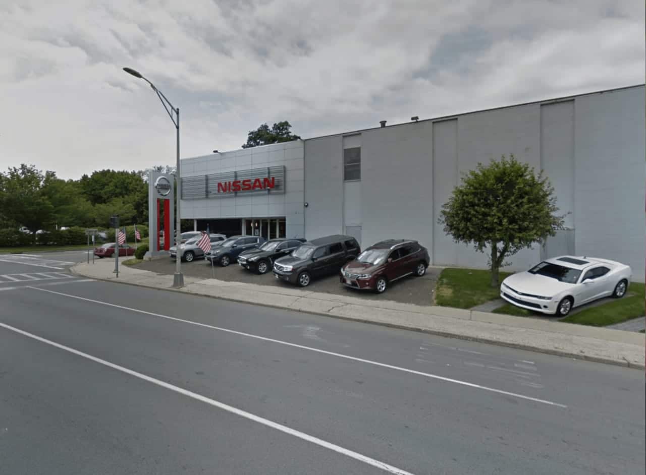 Nissan of New Rochelle has agreed to pay back customers for 'add-on' sales.