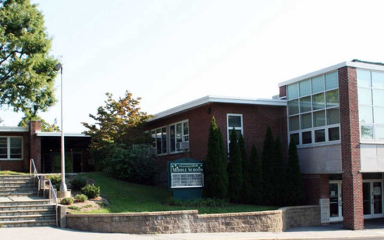 A student at Pleasantville Middle School mother is claiming his father is 'radicalizing' him.