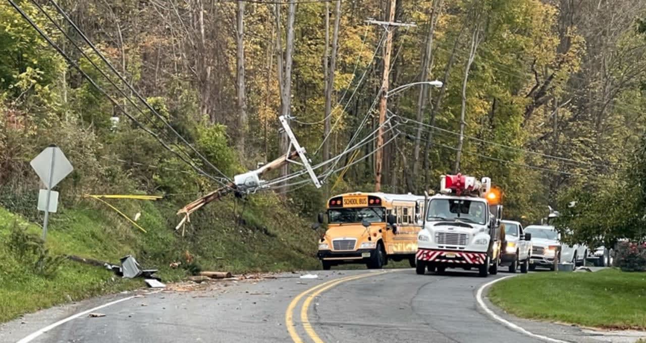 A Wednesday morning dump truck crash backed up traffic and caused power outages for nearby residents on Route 517, authorities said.