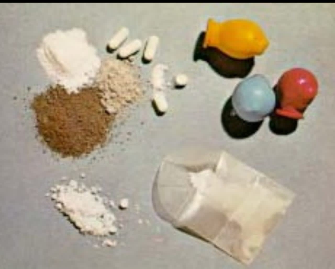 In this photo illustration, you can see what heroin looks like in powder and pill form.